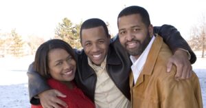 Image of a smiling family on PSA Insurance & Financial Services' website