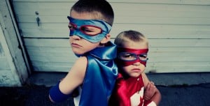 Image of two young boys in superhero costumes on PSA Insurance & Financial Services' website
