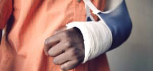 Image of a person's arm in a sling on PSA Financial's website