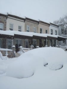 Image of rowhouses in the snow on PSA Insurance & Financial Services' website