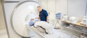 Image of a person receiving a medical scan on PSA Financial's website