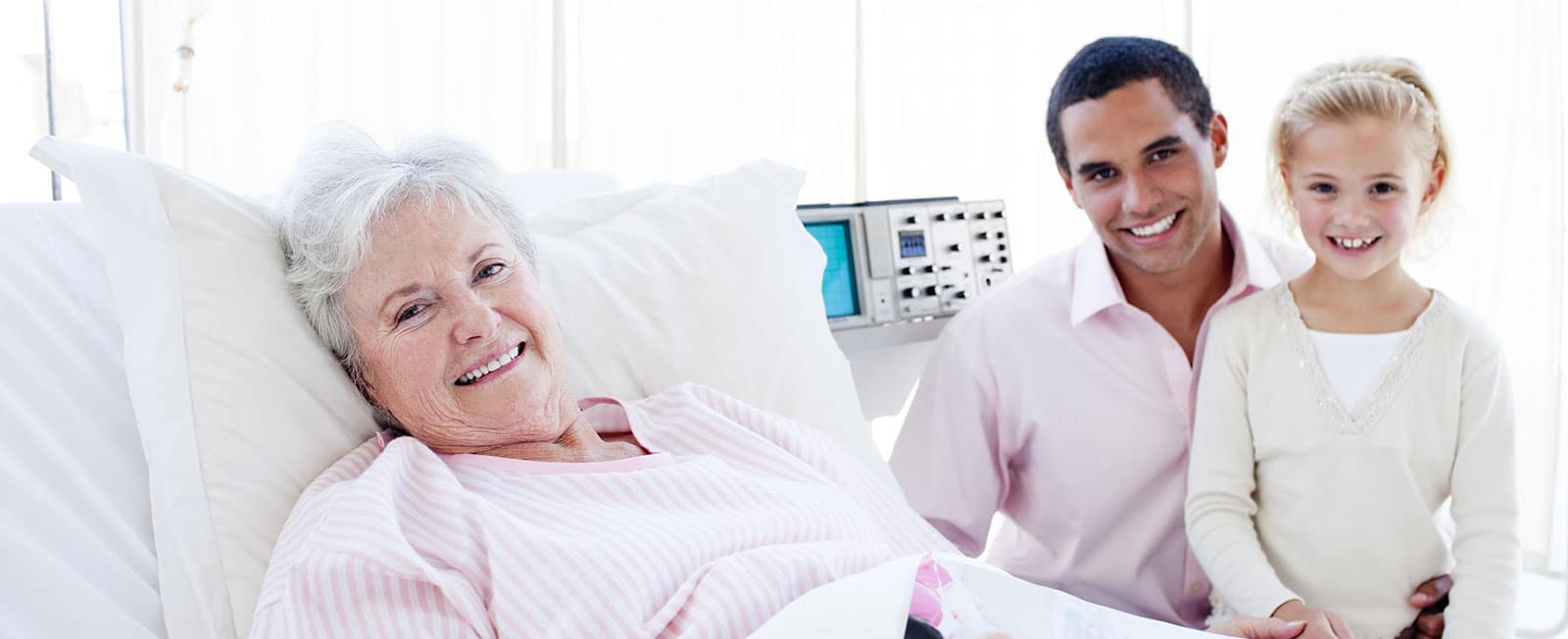 Image of a family smiling in a hospital room on PSA Financial's website