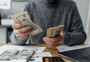 Image of a person counting money