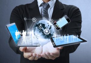 Image of a person holding graphic icons representing technology on PSA Insurance and Financial Services' website
