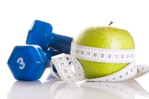 Image of an apple, measuring tape and weights on PSA Insurance and Financial Services' website