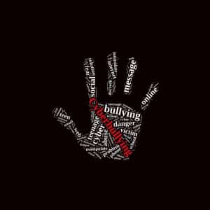 Image of a handprint made of various words related to cyberbullying