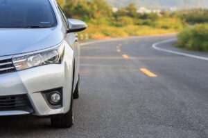 Image of a car driving on a road