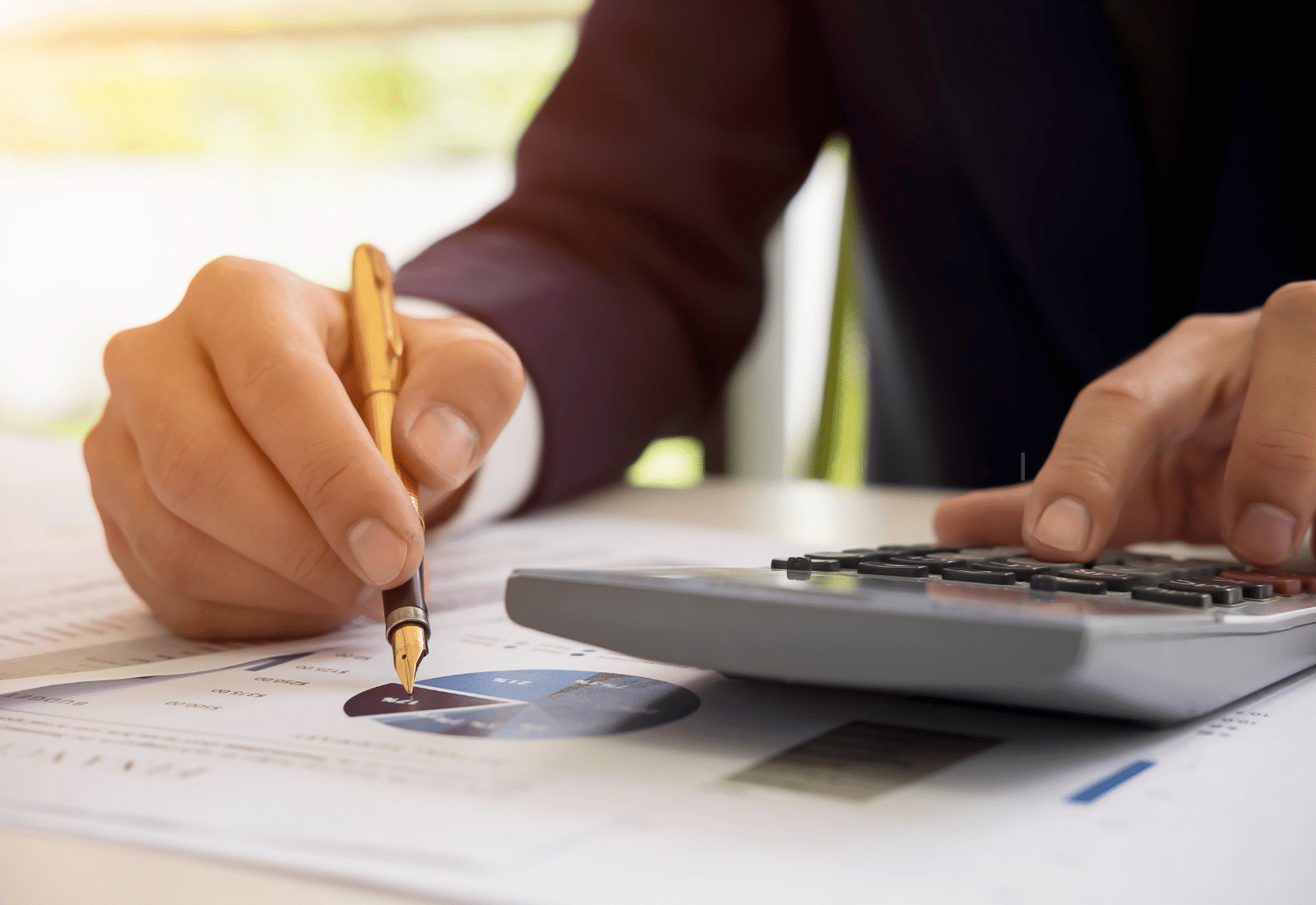 Image of an employer calculating costs