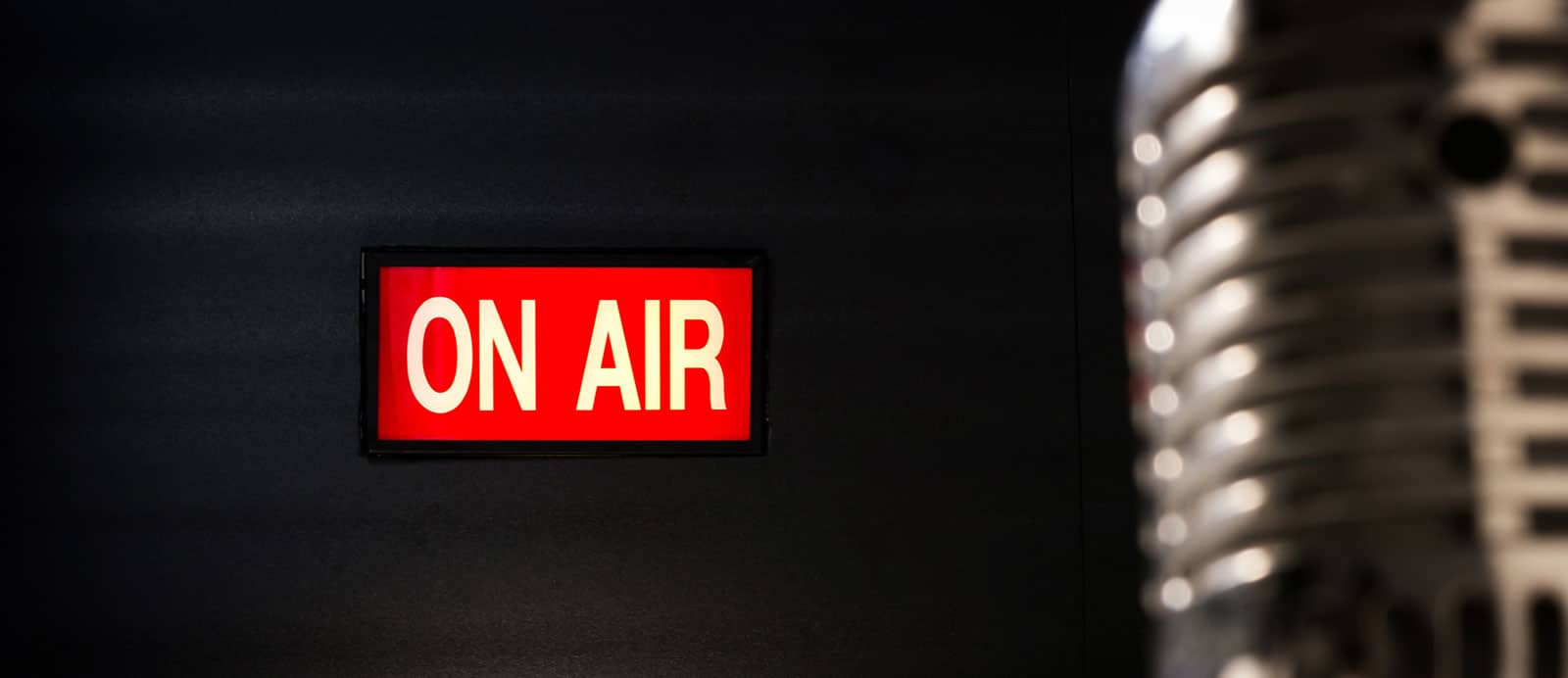 Image of a red sign reading "On Air" on PSA Insurance & Financial Services' website