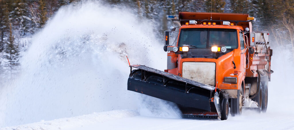 Image of a truck removing snow from the road
