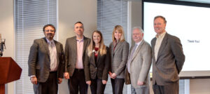 Image of smiling men and women on PSA Insurance & Financial Services' website