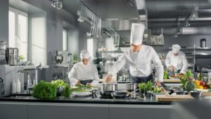 Image of chefs working in a commercial kitchen on PSA Insurance & Financial Services' website