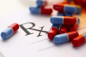 Pills on a prescription slip on PSA Financial's website