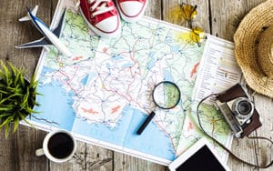 Image of a map, magnifying glass, and shoes on PSA Financial's website