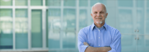 Image of a man with his arms crossed on PSA Financial's website