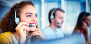 woman from Commercial Insurance Service Team speaking though headphones