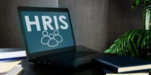 The letters HRIS on a laptop screen on PSA Insurance & Financial Services' website
