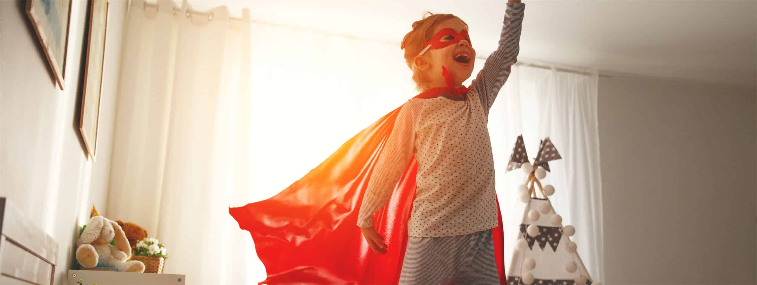 Image of a child dressed like a superhero on PSA Insurance & Financial Services' website