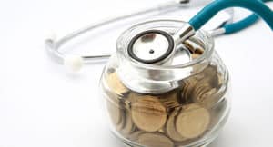 Image of a stethescope and a jar of coins on PSA Insurance & Financial Services' website