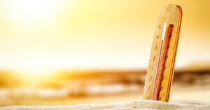 Image of a thermometer in the sand
