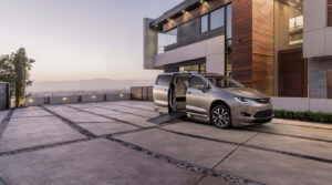 photo of a car and a mansion
