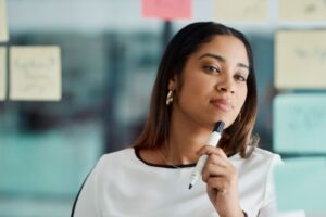 Image of a woman with a pen