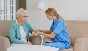 Image of a medical professional helping a patient